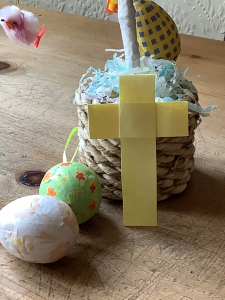paper cross with painted eggs